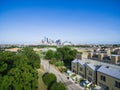 Top view suburban residential houses with downtown Houston in ba