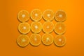 Top view summer pattern of fresh orange slices isolated on orange color gradient background with Clipping Path.