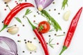 Top view of summer vegetables: onion, garlic, tomato, red pepper, rosemary and peppercorns on white table background.