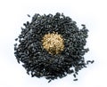 Top view of sunflower black seeds and peeled seeds