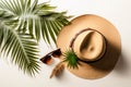 Top view of sunhat, stylish sunglasses and palm leaf. Travel concept. Generative AI