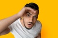 Top view of surprised middle eastern guy looking at camera Royalty Free Stock Photo