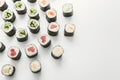 Top view on sushi rolls, maki on white background
