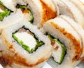 Top view on sushi set isolated over white background. Plate with rolls close-up. Royalty Free Stock Photo