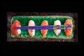 Top view of a sushis plate on black background Royalty Free Stock Photo