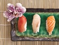 Top view of a sushis plate with an orchid Royalty Free Stock Photo