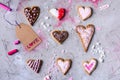 Sweet heart shaped cookies with love tag on grey cracked surface