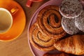 Top view of sweet rolls and coffee on table set Royalty Free Stock Photo