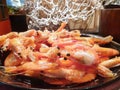 Top view of sweet shrimp on black plate in Japanese restaurant