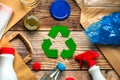 Top view of Symbol of recycling with different garbage materials. Eco friendly recycling concept Royalty Free Stock Photo