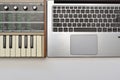 Top view of synthesizer and laptop computer for creating sound and music production. Home studio workspace for recording music. Royalty Free Stock Photo