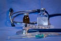 Top view of syringes, stethoscope, and medicine bottles Royalty Free Stock Photo