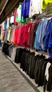 Top view of t-shirts in the market, sale of t-shirts in a sports store Royalty Free Stock Photo