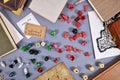 Top view of tabletop roleplaying flat lay with RPG and game dices, rule book, notes and treasure map Royalty Free Stock Photo