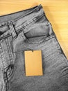 Top view tag price on black grey jeans Royalty Free Stock Photo