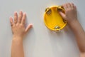 Top view of tambourine and child hands on the white background Royalty Free Stock Photo