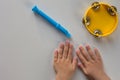 Top view of tambourine, pipe and child hands on the white background Royalty Free Stock Photo