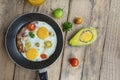 Fried bacon and egg in fry pan Royalty Free Stock Photo