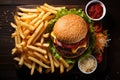 Tasty cheeseburger with french fries