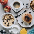 top view of tasty healthy breakfast with pancakes fruits and muesli Royalty Free Stock Photo