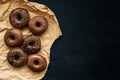 Top view of tasty homemade chocolate doughnuts