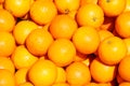 Top view of tasty oranges freshly collected background.