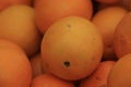 Top view of tasty spanish oranges freshly collected on a wooden box