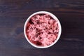 Top view of tasty strawberry chocolate chunk ice cream on dark color wooden background