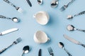 top view of tea cups surrounded by flatware