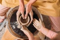 top view of teacher and kid making ceramic pot Royalty Free Stock Photo