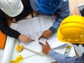Top view teamwork concept, Engineer and workers discussing project of new building. ,Team of architects Asian people in group on
