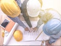 Top view teamwork concept, Engineer and workers discussing project of new building. ,Team of architects Asian people in group on Royalty Free Stock Photo