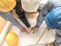 Top view teamwork concept, Engineer and workers discussing project of new building. ,Team of architects Asian people in group on Royalty Free Stock Photo