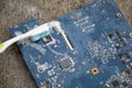 Top view. Technician cleaning motherboard. computer with cleaning solution