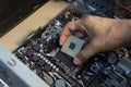 top view technician inserting cpu, computer assembler