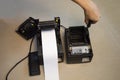 Top view. Technician repairing printer, thermal printer Royalty Free Stock Photo