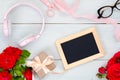 Top view teenage girl home office desk. Flat lay beauty blogger workspace with picture frame and feminine accessories on pastel Royalty Free Stock Photo