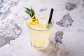 Top view tequila, lemon, rosemary fizz. Alcoholic drink in glasses with fresh herbs on a gray background, selective Royalty Free Stock Photo