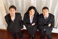 Top view of three business people looking up Royalty Free Stock Photo