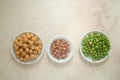 Top view of three different types of beans in bowls Royalty Free Stock Photo