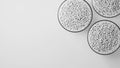 Top view on three glass cups with white plastic polypropylene granules, masterbatch polymer grain, on white backdrop Royalty Free Stock Photo