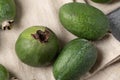 Top view of three green feijoa berries of different shapes. Tropical fruit for smoothies, am Royalty Free Stock Photo