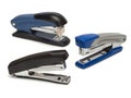 Top view of three staplers isolated on white background. Royalty Free Stock Photo