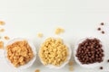 Top View Three Various Cereal Breakfast on White Bowl