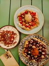 top view of three waffle dishes with ice cream, chocolate, strawberries Royalty Free Stock Photo