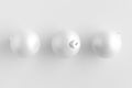 Top view of a three white matte christmas balls