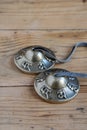 Top view of Tibetan cymbals on wooden table, vertical, Royalty Free Stock Photo