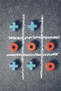 Top view of tic tac toe game on dark background Royalty Free Stock Photo