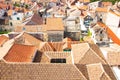 Top view of tiled roofs of houses, Trogir, Croatia. Old town of Trogir, UNESCO heritage Royalty Free Stock Photo