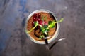 top view tiramisu dessert with berries in a glass on the table